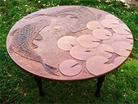 Mahogany wall plaque with relief carved carp pond